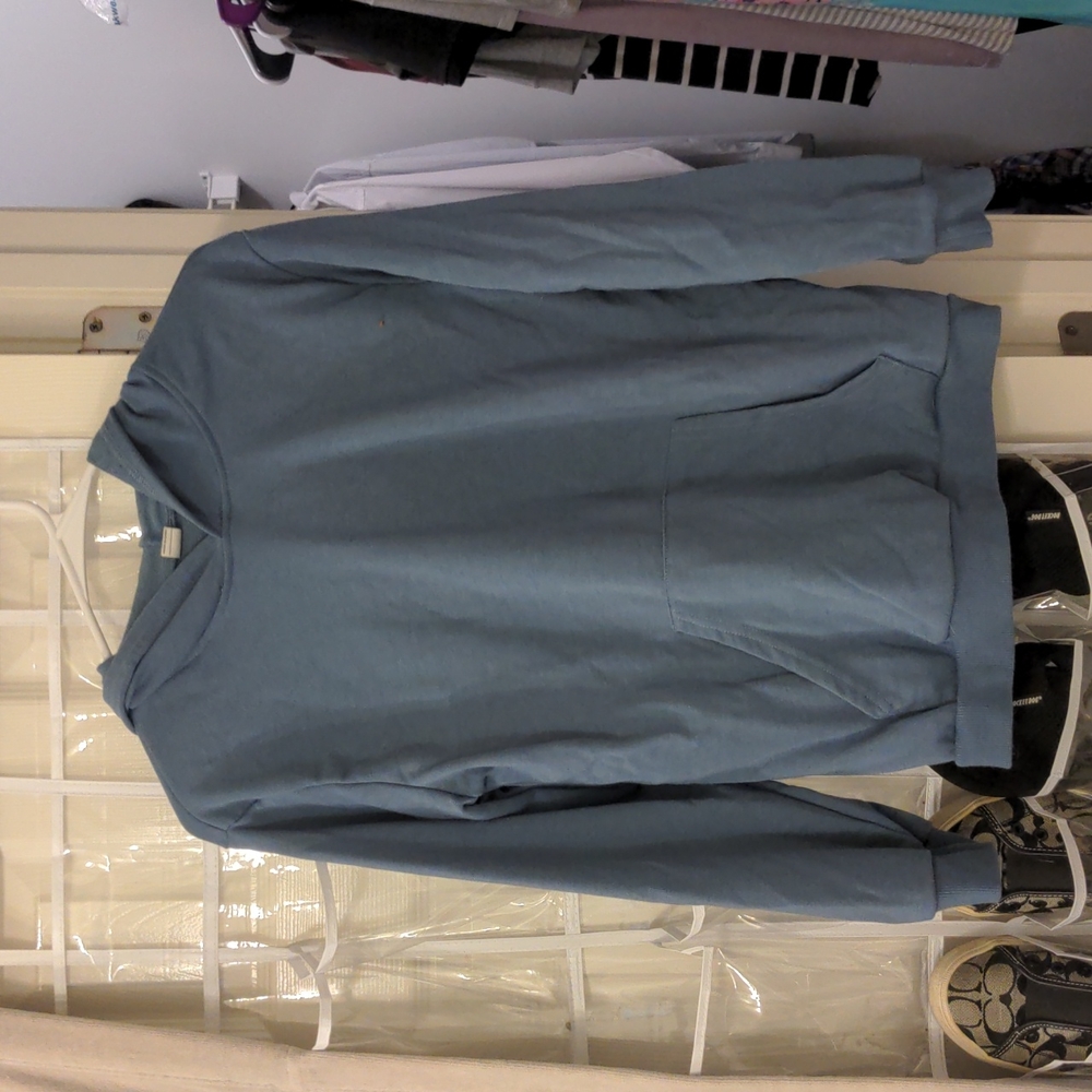 New without tags blue hoodie size 13-14 years